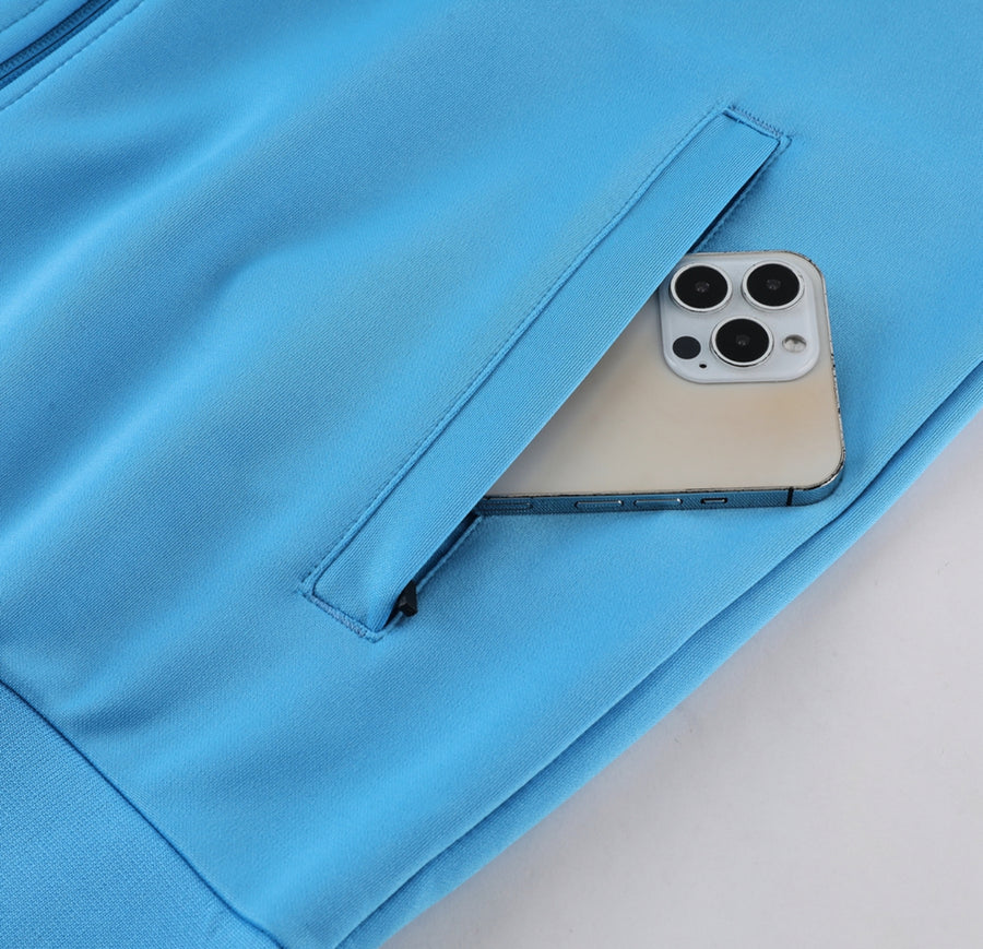 Survêtement jogging Nike Repeat logo bleu clair