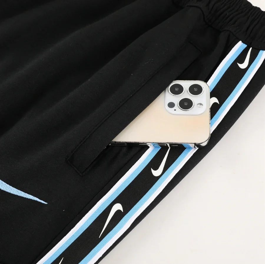 Survêtement jogging Nike Repeat logo bleu clair